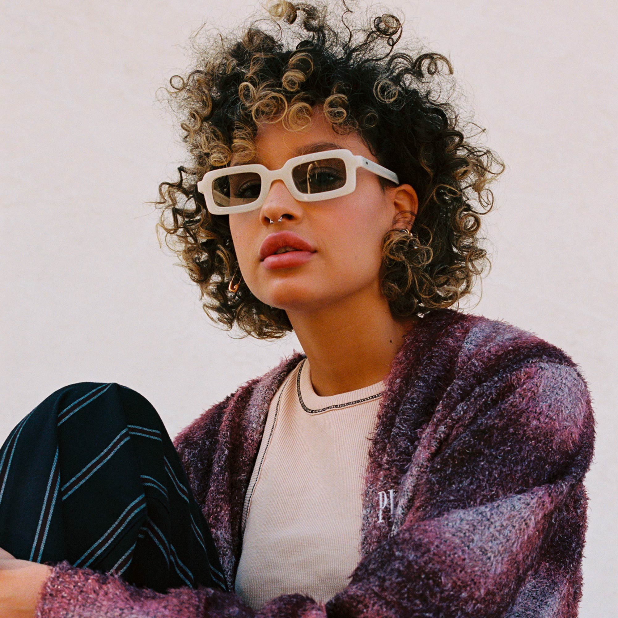Akila Eos Ivory and Grey lens sunglasses on model